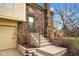 Brick home with a concrete stairway entrance and metal railings leading to the front door at 1847 Crystal Bay East Dr, Plainfield, IN 46168