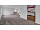 Open floor plan with view to kitchen and carpeted living area at 1847 Crystal Bay East Dr, Plainfield, IN 46168