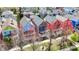 Scenic aerial shot capturing charming neighborhood with colorful homes, trees, and manicured lawns at 2037 Rhettsbury St, Carmel, IN 46032