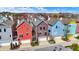 An aerial view showcases colorful homes with private garages and manicured lawns at 2037 Rhettsbury St, Carmel, IN 46032