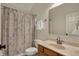 Neutral bathroom featuring a shower with patterned curtain and a vanity with a light countertop at 2037 Rhettsbury St, Carmel, IN 46032