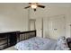 Bedroom featuring a bed, dresser, double door closet and an adjacent bathroom at 2037 Rhettsbury St, Carmel, IN 46032