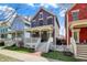 Charming two-story home with a inviting front porch and well-maintained landscaping at 2037 Rhettsbury St, Carmel, IN 46032