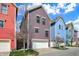 Contemporary living is exemplified by charming colorful homes with attached garages at 2037 Rhettsbury St, Carmel, IN 46032