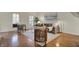 Bright living room with hardwood floors, stylish furniture, and natural light from large windows at 2037 Rhettsbury St, Carmel, IN 46032