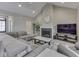 Bright living room featuring a fireplace, comfortable seating, and an open layout at 2145 W Bedrock Ln, Greenfield, IN 46140