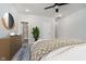 Stylish main bedroom featuring a modern dresser and an attached bathroom at 242 N Tacoma Ave, Indianapolis, IN 46201