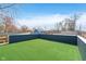 Rooftop deck featuring expansive turf area, perfect for outdoor activities or lounging at 242 N Tacoma Ave, Indianapolis, IN 46201