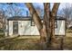 Cozy home with a well-maintained exterior, stylish front door, and neat landscaping at 2835 S Lyons Ave, Indianapolis, IN 46241
