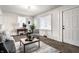 Cozy living room featuring paneled walls, an area rug, and stylish furniture at 2835 S Lyons Ave, Indianapolis, IN 46241