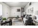 Open-concept living room features neutral walls, and an area rug at 2835 S Lyons Ave, Indianapolis, IN 46241
