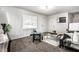 Bright living room featuring neutral walls, an area rug, and stylish furniture at 2835 S Lyons Ave, Indianapolis, IN 46241