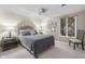 Cozy bedroom features a queen-size bed, bedside tables, and a window with natural light at 3849 Waycross Dr, Columbus, IN 47203