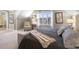 Bright bedroom features natural lighting, neutral tones, and carpet at 3849 Waycross Dr, Columbus, IN 47203