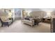 Bedroom features ample lighting, neutral tones, and carpet at 3849 Waycross Dr, Columbus, IN 47203