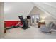 Bonus room with athletic equipment and seating at 3849 Waycross Dr, Columbus, IN 47203