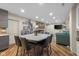 Open living space featuring a kitchen, dining area, fireplace, and comfortable seating, ideal for modern living at 3849 Waycross Dr, Columbus, IN 47203