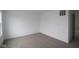 Bright, carpeted bedroom with ample natural light and a closet, perfect for relaxation at 3913 Highcrest Rd, Indianapolis, IN 46239