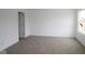 Bright, carpeted bedroom with ample natural light and a closet, perfect for relaxation at 3913 Highcrest Rd, Indianapolis, IN 46239