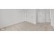 Bright bedroom featuring neutral carpet, white walls, closet and doorway at 3913 Highcrest Rd, Indianapolis, IN 46239