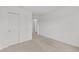 Bright bedroom featuring neutral carpet, white walls, closet and doorway at 3913 Highcrest Rd, Indianapolis, IN 46239