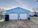 A detached two-car garage provides ample storage and parking space for vehicles and equipment at 3932 Caroline Ave, Indianapolis, IN 46205