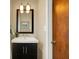 Cozy bathroom features modern vanity, decorative mirror, and a stylish, space-saving design at 4146 Roselawn Ave, Columbus, IN 47203