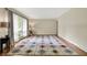 Hardwood floors and natural light fill this spacious living room at 4146 Roselawn Ave, Columbus, IN 47203