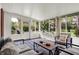 Bright sunroom featuring modern furniture, ample windows, and a cozy atmosphere at 4146 Roselawn Ave, Columbus, IN 47203