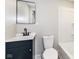 Updated bathroom features a sleek black faucet, modern vanity, and a bright, clean shower/tub combo at 435 N Chestnut St, Monrovia, IN 46157