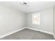 Neutral bedroom with carpet, a window to the outside, a ceiling fan, and lots of light at 435 N Chestnut St, Monrovia, IN 46157