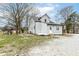 Charming two-story home featuring a well-maintained yard and gravel driveway at 435 N Chestnut St, Monrovia, IN 46157