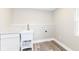 Clean and bright laundry room featuring a sink, countertop, and connections for laundry machines at 435 N Chestnut St, Monrovia, IN 46157