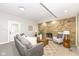 Cozy living room featuring a stone fireplace, recessed lighting, and comfortable seating arrangement at 435 N Chestnut St, Monrovia, IN 46157