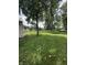 Large backyard with a trampoline, providing ample space for recreation and outdoor activities at 4904 Betholm Dr, Indianapolis, IN 46239