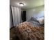 Well lit bedroom with a view to the outside featuring wood floors at 4904 Betholm Dr, Indianapolis, IN 46239