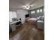 Bedroom features a desk with vanity and ceiling fan at 4904 Betholm Dr, Indianapolis, IN 46239