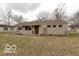 Charming single-story home featuring stone facade and well-maintained front yard landscaping at 4904 Betholm Dr, Indianapolis, IN 46239