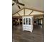 Open living area showcasing hardwood floors and modern design, connecting seamlessly to the kitchen at 4904 Betholm Dr, Indianapolis, IN 46239