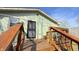 Back deck with decorative railings and steps, ideal for relaxation and outdoor dining at 4929 Kingsley Dr, Indianapolis, IN 46205