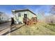 Private backyard deck with wooden railings and stairs, perfect for outdoor entertaining at 4929 Kingsley Dr, Indianapolis, IN 46205