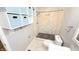 Beautiful bathroom with a walk-in shower, marble accents, and modern storage solutions at 4929 Kingsley Dr, Indianapolis, IN 46205