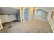 Spacious carpeted bedroom featuring ample space, a closet, and neutral wall paint at 4929 Kingsley Dr, Indianapolis, IN 46205