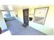 Welcoming front porch with decorative door, updated lighting and a charming place to sit at 4929 Kingsley Dr, Indianapolis, IN 46205