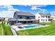 Aerial view showcasing in-ground pool, spacious yard, with landscaping at 5120 Melbourne Pl, Zionsville, IN 46077