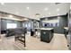 Finished basement showing bar and tv area, with recessed lighting and light-toned flooring at 5120 Melbourne Pl, Zionsville, IN 46077