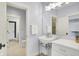 Charming bathroom featuring a classic pedestal sink and timeless fixtures, with a view to other rooms at 5120 Melbourne Pl, Zionsville, IN 46077