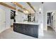 Elegant bathroom showcasing a double vanity, chandelier, wooden beams and lots of light at 5120 Melbourne Pl, Zionsville, IN 46077