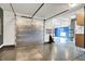 Spacious garage featuring an insulated door, ample storage cabinets, and a clean, well-organized interior at 5120 Melbourne Pl, Zionsville, IN 46077