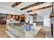 Spacious living room showcases open floor plan leading to the kitchen and dining area at 5120 Melbourne Pl, Zionsville, IN 46077